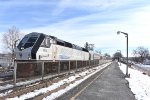 Westbound NJT Multilevel Consist about to stop at Lyndhurst Station behind a PL42AC